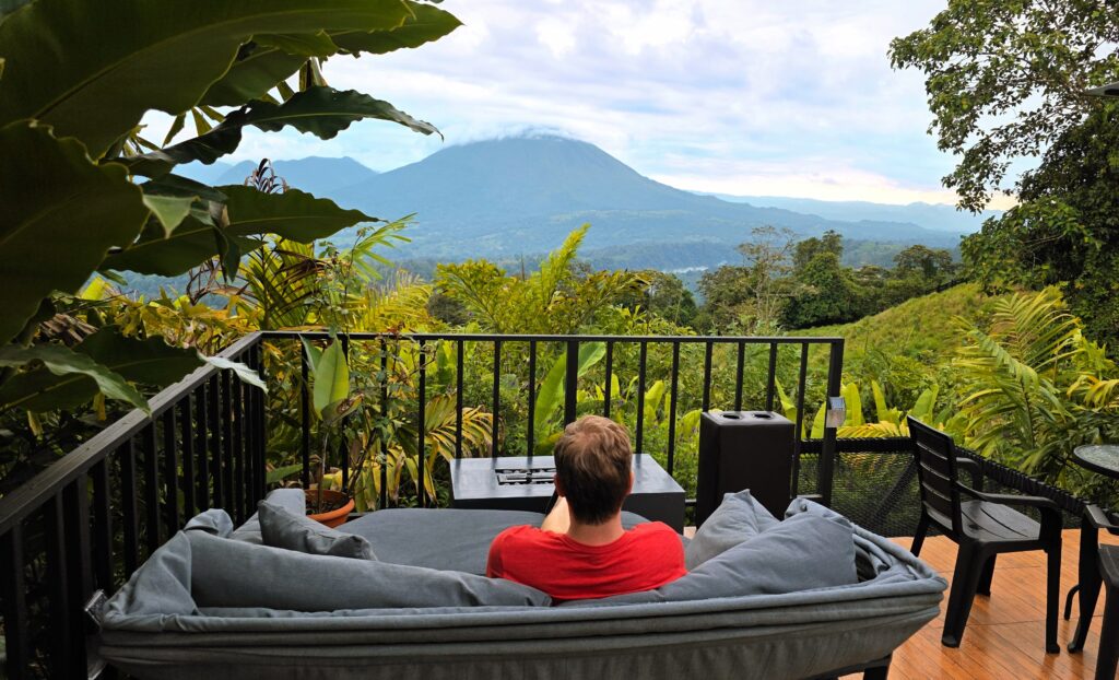 Best places to stay in La Fortuna for families - balcony with view of Arenal volcano