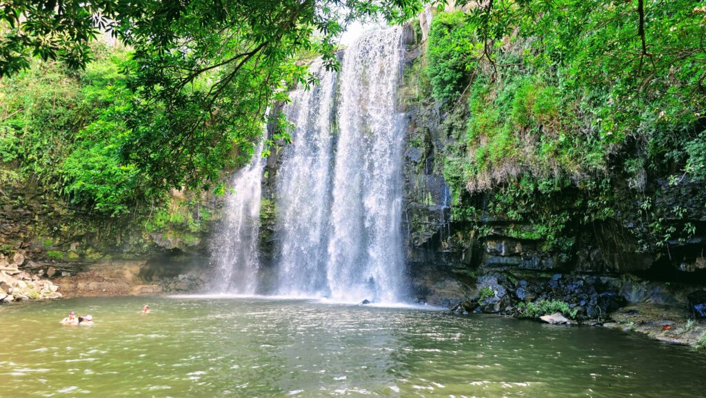 Costa Rica Itinerary with Kids -Swimming next to Llanos de Cortez waterfalls