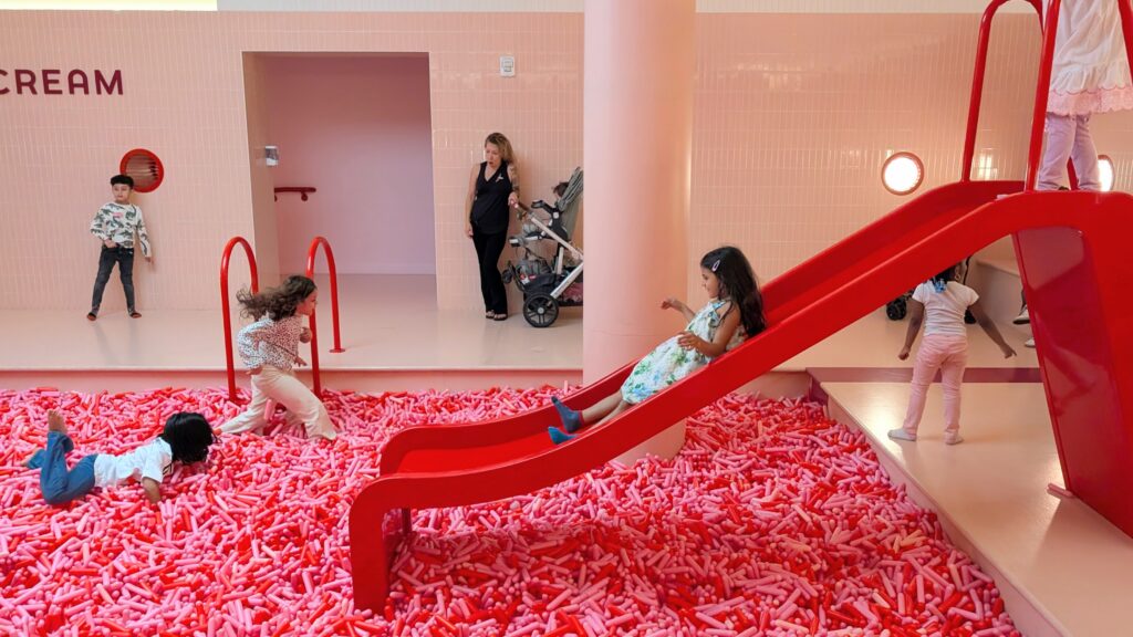 Sliding into a pool of sprinkles at the Museum of Ice Cream