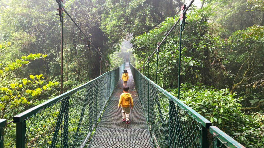 Things to do with kids in La Fortuna - Walking across a hanging bridge in Costa Rica