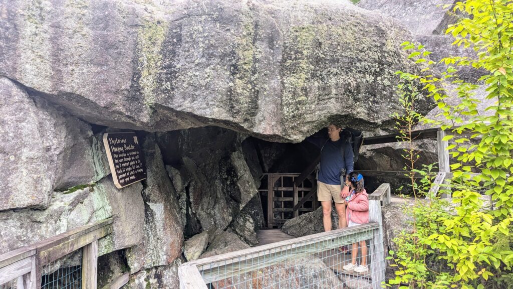 New Hampshire road trip with kids - Exploring a cave trail at Polar Caves Park